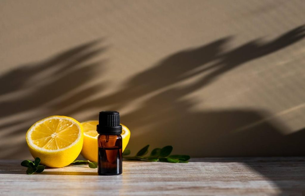 Citrus essential oil with lemon slices for mood lifting and stress relief.
