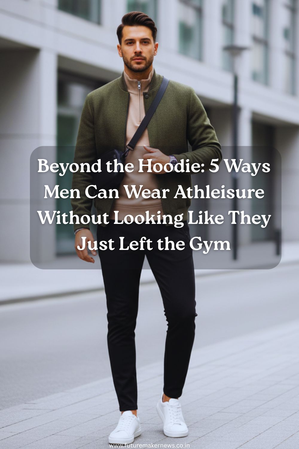 A fashionable man in tailored joggers, a zip-up sweatshirt, and sneakers layered with a blazer, representing modern elevated athleisure style.