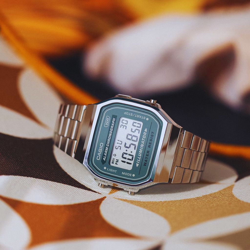Retro Casio A168 vintage digital watch styled with 2000s-inspired accessories.