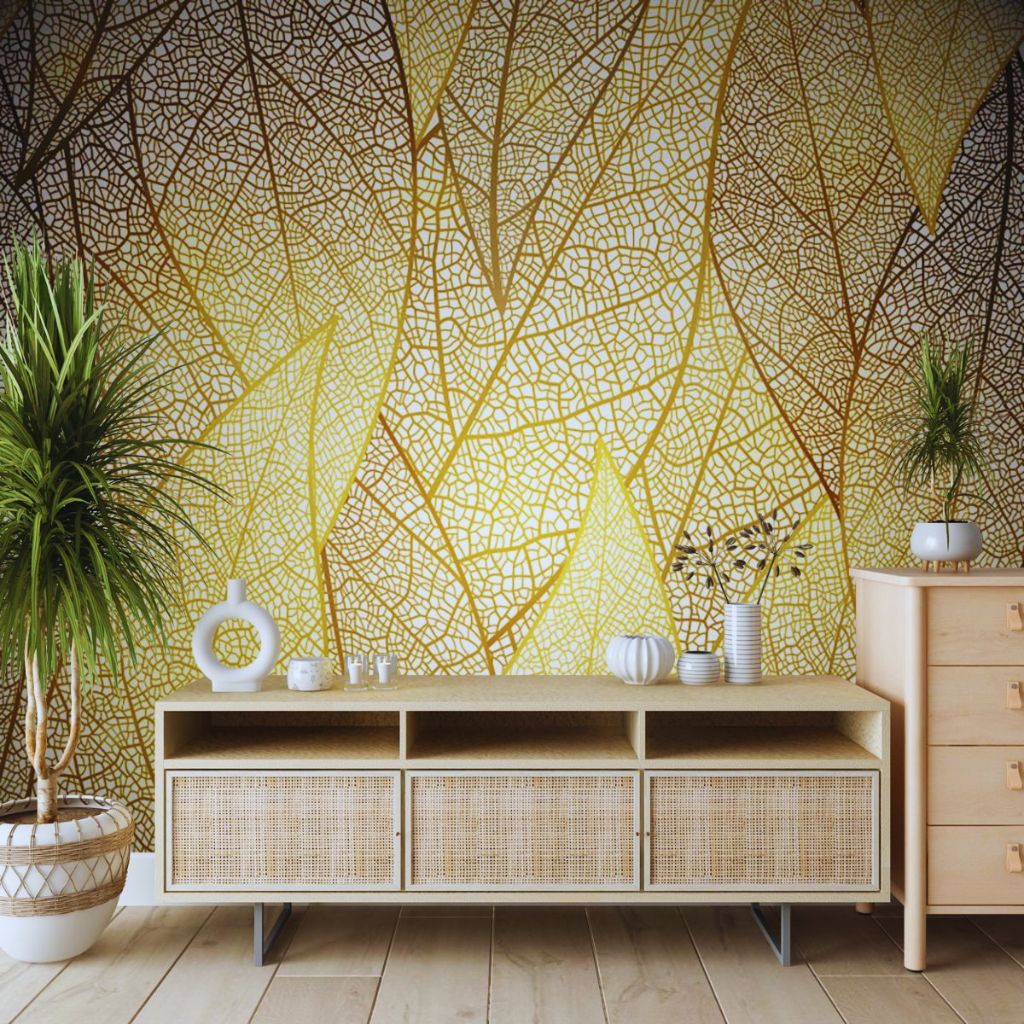 DIY textured wall art featuring gold leaf accents on raised areas for an elegant metallic finish.