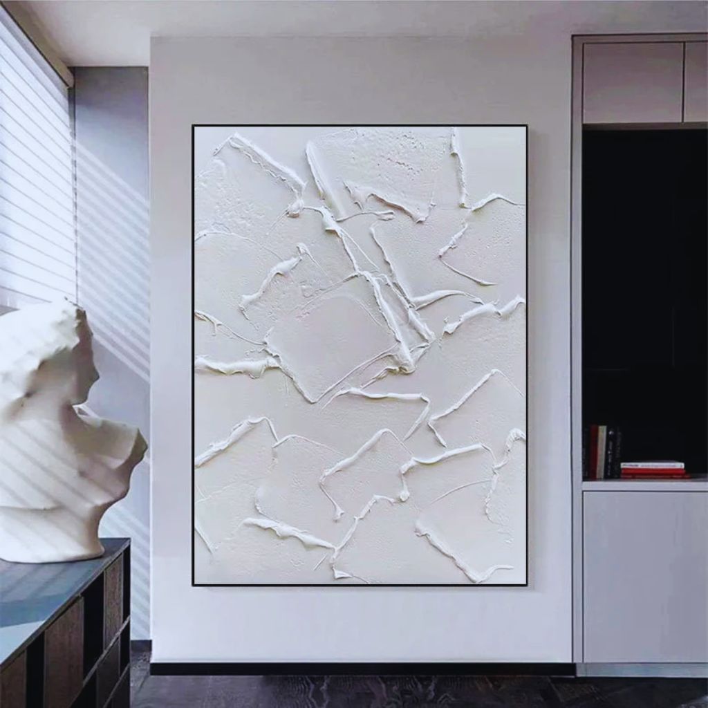 DIY raised line art showing abstract white-on-white 3D patterns created with hot glue and paint.