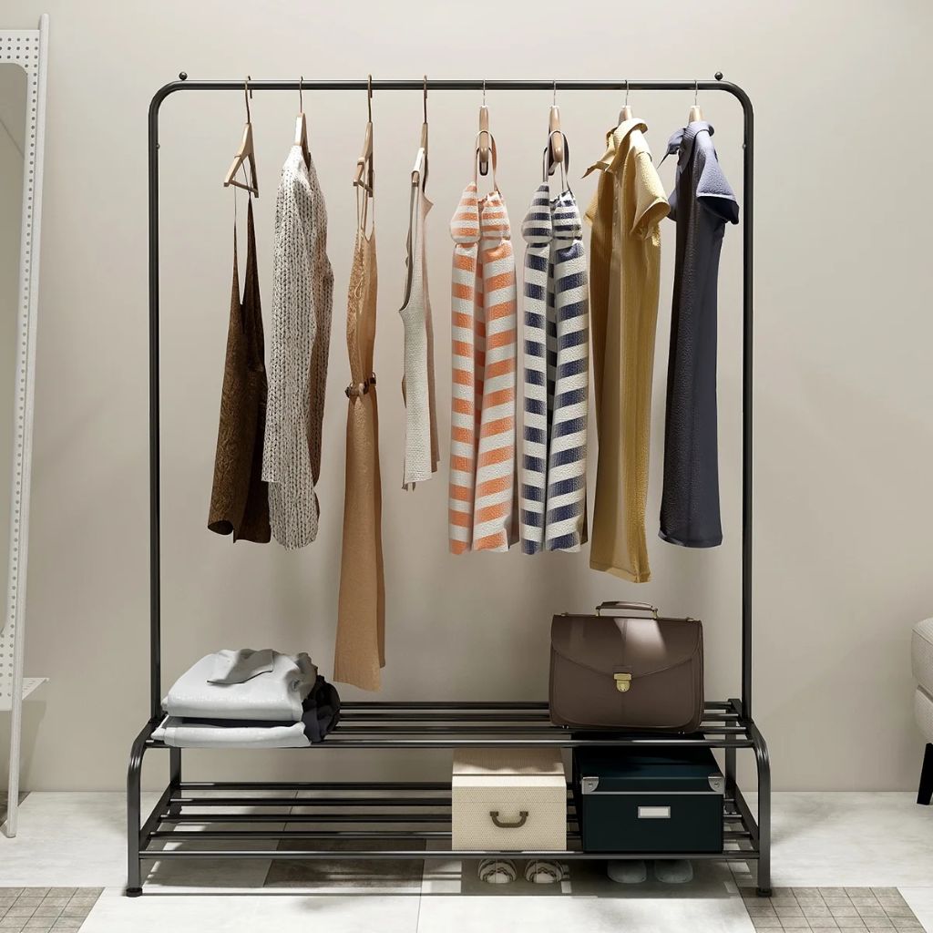 Minimalist clothing rack with neutral and muted color palette for capsule wardrobe styling.