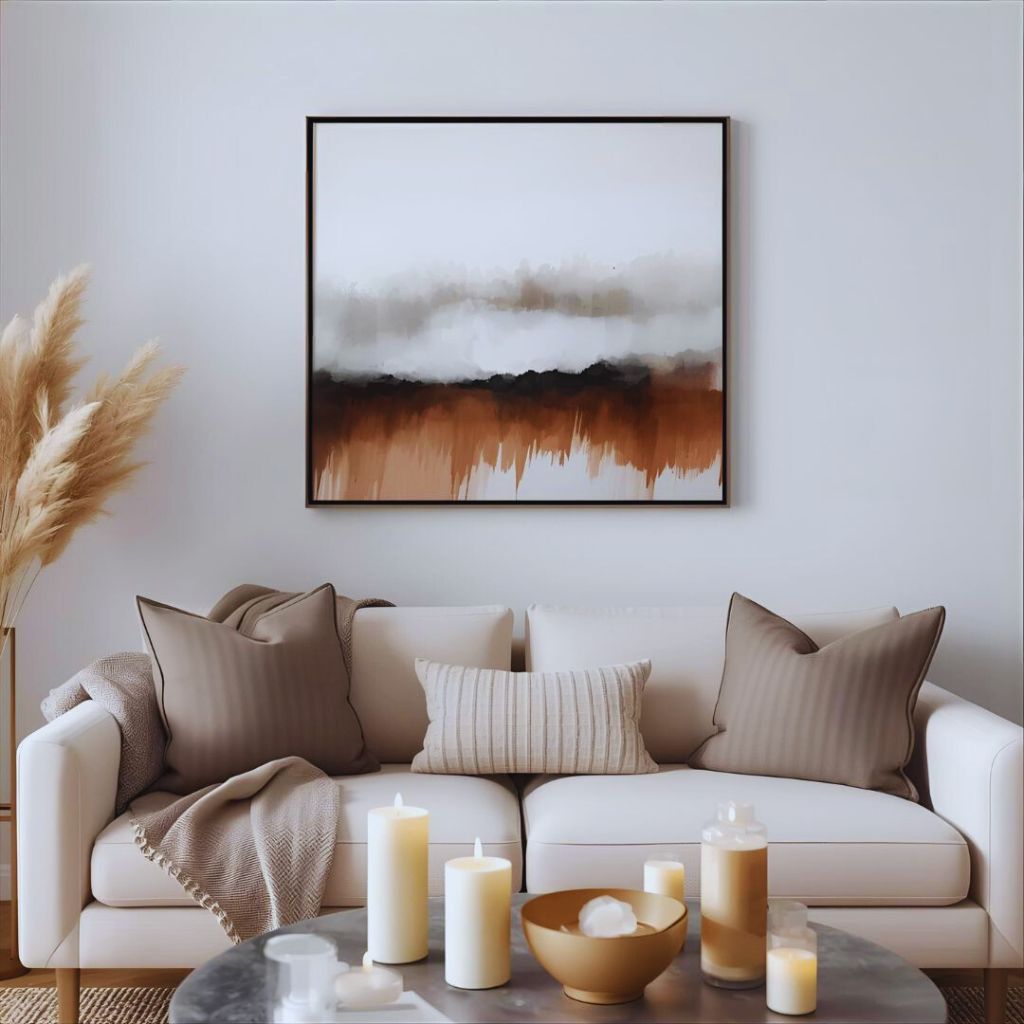 Modern living room styled with handmade textured wall art above a neutral-toned sofa.