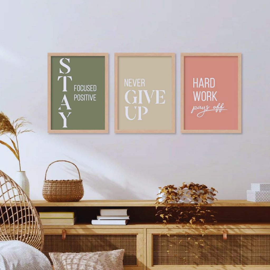 Asymmetrical gallery wall with mixed frame sizes and organic layout creating a creative, relaxed interior look.