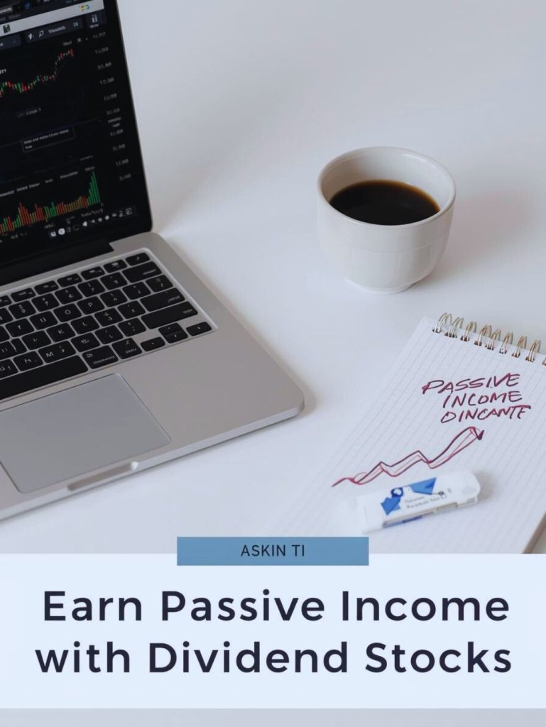 Laptop displaying stock charts and dividend growth representing passive income through investing in dividend-paying stocks.